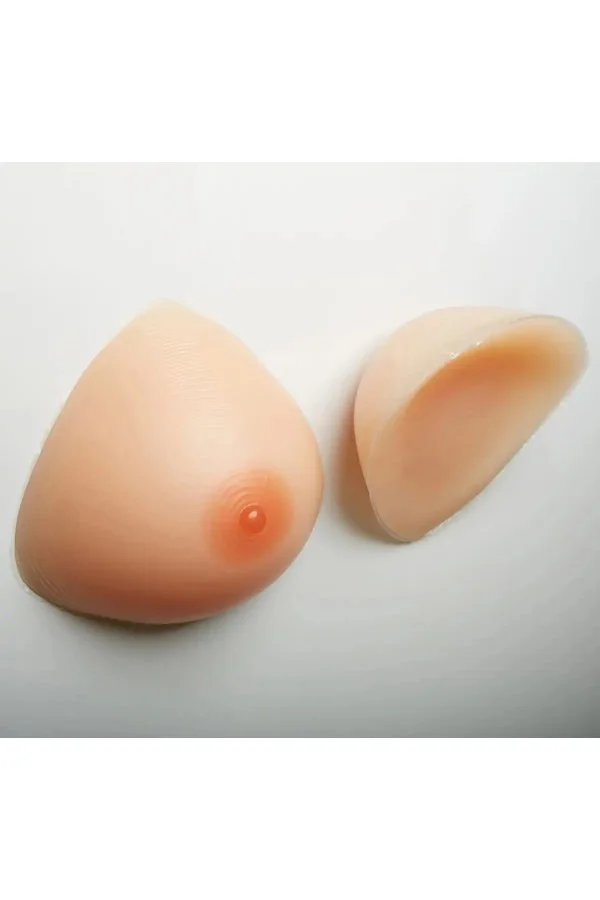 Faux seins silicone, forme triangle